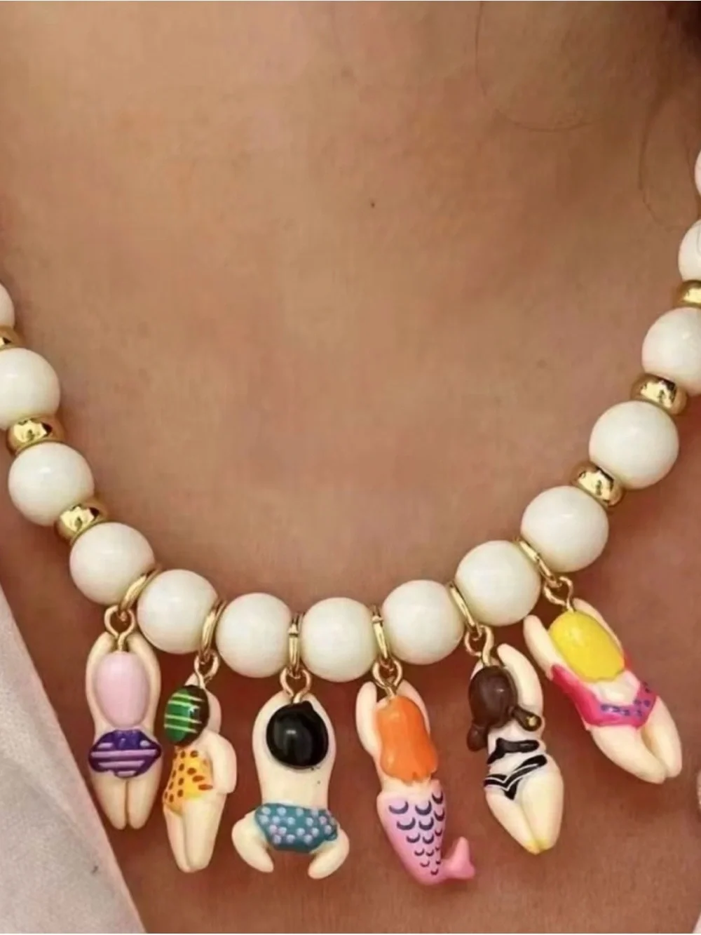 Anthropologie White Beaded Necklace with Colorful Swimmer & Mermaid Charms